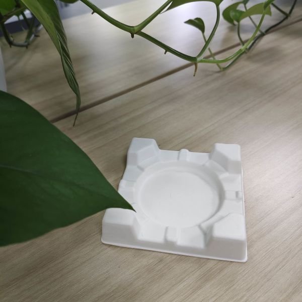 The pulp molding packaging bases for high-end Baijiu are produced in Chinese factories. They are shockproof, drop-resistant, environmentally friendly