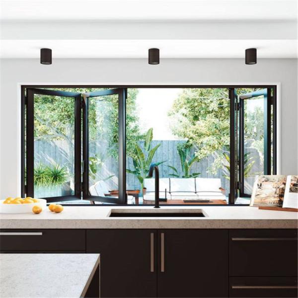Alpine View Folding Window Configuration Framing Dramatic Elevation Changes and Cloud Formations