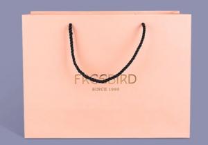 Quality Delicate Bespoke Printed Paper Bags , Pink Paper Carrier Bags Accurate 4C Printing for sale