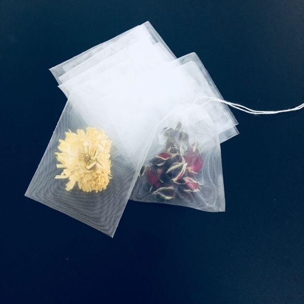 Biodegradable Corn Fiber Mesh Filter Bags , Empty Nylon Pyramid Tea Bags With Tag