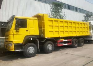 Quality HOWO 8x4 Heavy Duty Dump Truck , LHD Sinotruk Tipper Truck Yellow Color for sale