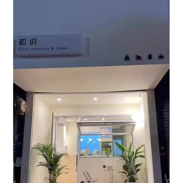 Fruit Tree Facing Folding Window Configuration Framing Blossom Seasons and Harvest Views from Kitchen Sinks